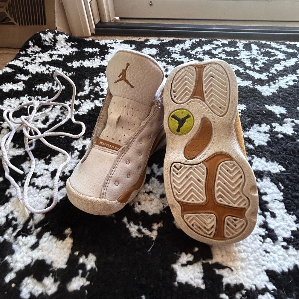 Jordan White and Gold Sneakers with Sleek Design